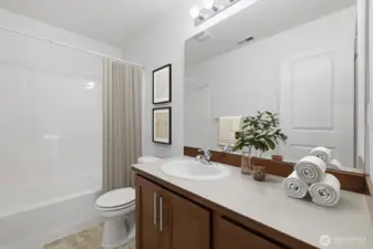 Upstairs bathroom (virtually staged)