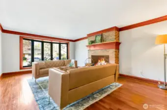 Formal LR has a brick fireplace.