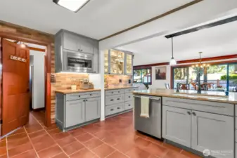 The laundry room and ample pantry storage is just off the kitchen.