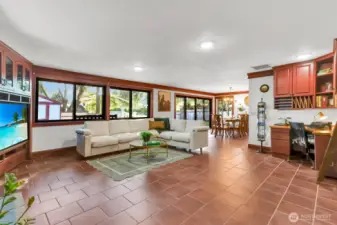 Open and light family room has a built in home office.