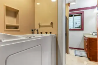 Easy enter walk in tub in the primary bath. Also has a shower.