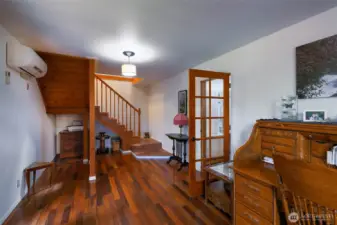 Entrance with door leading into Utility Room, Full bathroom and storage room.