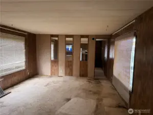 Large family room off kitchen waiting for you new ideas to make it shine again.  2 large windows bring in lots of light in morning and afternoon