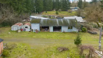 Garage/shop with woodstove, partial kitchen and 1/2 bath