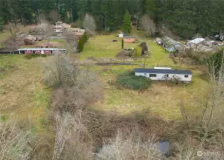 Creek is at the back of the property, this is looking toward the road from the back