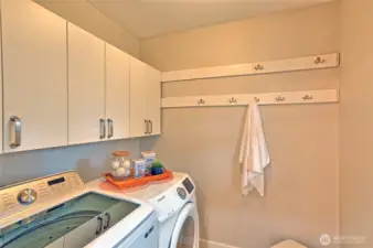 main floor laundry room, all appliances stay.