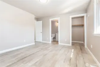 Primary Bedroom with walk-in closet and bath.