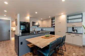 Staged unit B2 shown, similar to F2. Furniture and decor not included.
