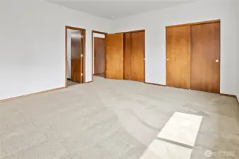 Two closets in primary bedroom.