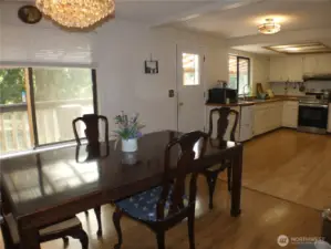 Dining opens to kitchen