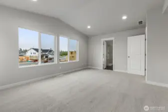 Primary bedroom    Photos of a finished home in same community