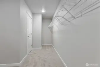 Primary Closet    Photos of a finished home in same community same floor plan