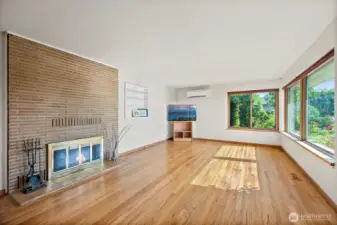 Cozy up in living room next to the wood burning fireplace