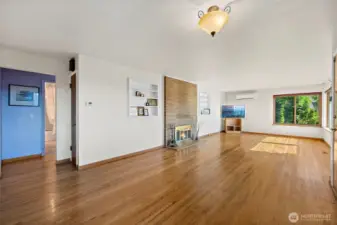 From dining room looking into living room and main hallaway