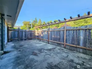 Fenced in patio off primary bedroom