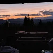 Backyard panoramic view of the olympic mts and foothills. Sunsets here bring peace and tranquility to your evenings on the patio.