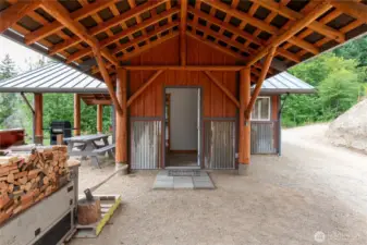 Covered entrance into the cabin.