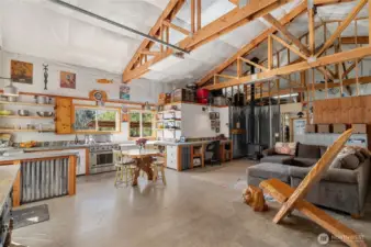 This is the interior of the shop on the kitchen and office side. There is PLENTY of room for an RV and boat and other toys. This is called The Adventure Hub!