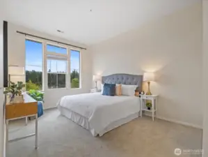 Primary suite- staged with a king sized bed.