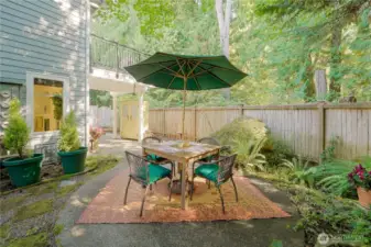 Established blueberries, ferns, and lovely landscaping in this private oasis.