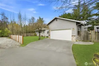 Welcoming single-level home with extra parking and a quiet setting.