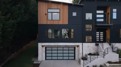 Striking Modern Sophisticated Home designed for you.  Every space was intentionally thought out for you. This is Elysium by Day