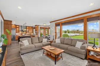 Family Room, with view into kitchen, casual dining area, and back yard