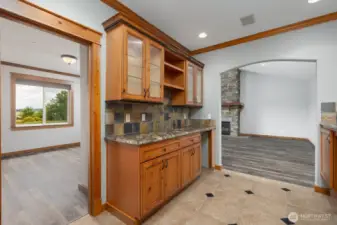 Wet Bar/Serving area leading to the 4th bedroom (on left) and bonus room (straight ahead)