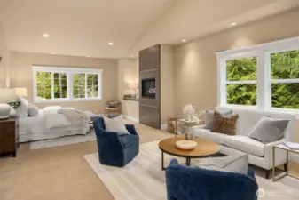Primary bedroom suite with fireplace and room for a sitting area