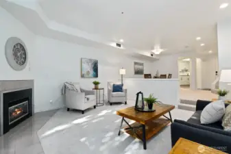 Spacious living area with cozy gas fireplace