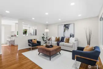 Nice sized living room with laminate wood floors