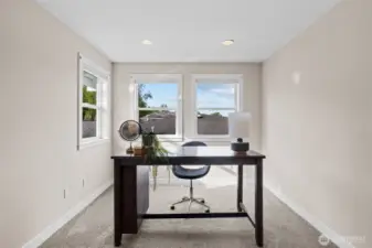 Double doors to home office with lake view.