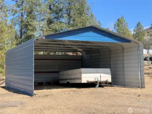 Carport for storing your toys or guest parking.