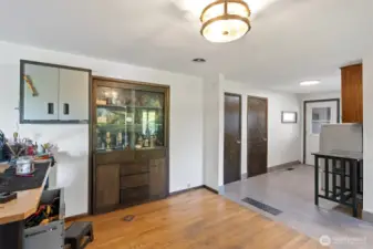Dining room looking towards the mud room/laundry and side door.
