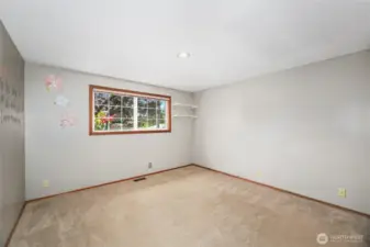 BEDROOM #2  Large  Walk-in closet with sliding door  Window overlooks front yard