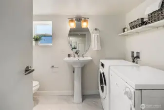 Downstairs 3/4 bathroom and laundry.