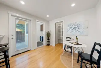 Large kitchen space that leads to pantry and laundry