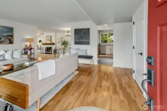 Original oak hardwood floors throughout the main living area.