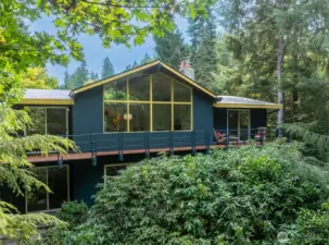 Nestled on a private drive in North Beach—yet close to everything—this retreat offers lush forest outlooks and a tranquil escape from city life.