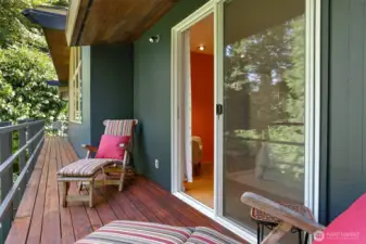 A cedar expanse spanning the home’s north side, the upper level is your elevated perch to sip morning coffee, listen to birdsong, and maybe even watch foxes meander through the ravine.