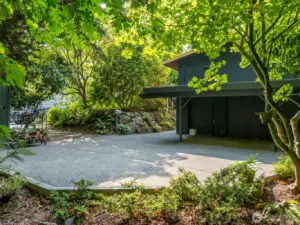 Ample off-street parking and a high-ceilinged carport shelters your vehicle, keeping you dry as you enter your home.