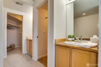 Dual vanities in the primary bath offer convenience and space—perfect for busy mornings or relaxing evenings.