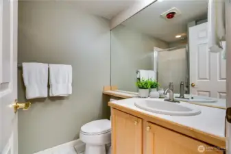 Conveniently located near the second bedroom, the full guest bath includes its own shower.