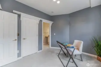 Ground floor bedroom, staged as office. Attached 3/4 bath, perfect for home office or long-term guests
