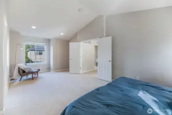 Tons of natural light and vaulted ceilings in the primary bedroom