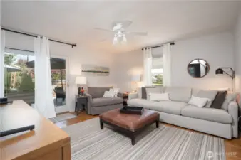 Located on the main floor, this bedroom, with French doors leading to the expansive patio, is currently used as a wonderful overflow space when entertaining and a chill spot reading spot/t.v. area, but with 5 plus bedrooms in this home, every room becomes whatever you want it to be. Let's take a peek at what lies outside...