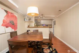 The downstairs unit has its own dining space and kitchen.