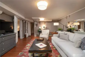 To the left of the living room is a sleep suite, dining room, kitchen, and 3/4 bath.  We saw those, now let's head back upstairs and visit the top floor.