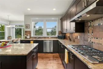 Large Island, gas range  granite counters