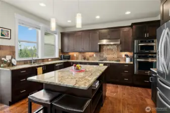 Island kitchen with granite counters